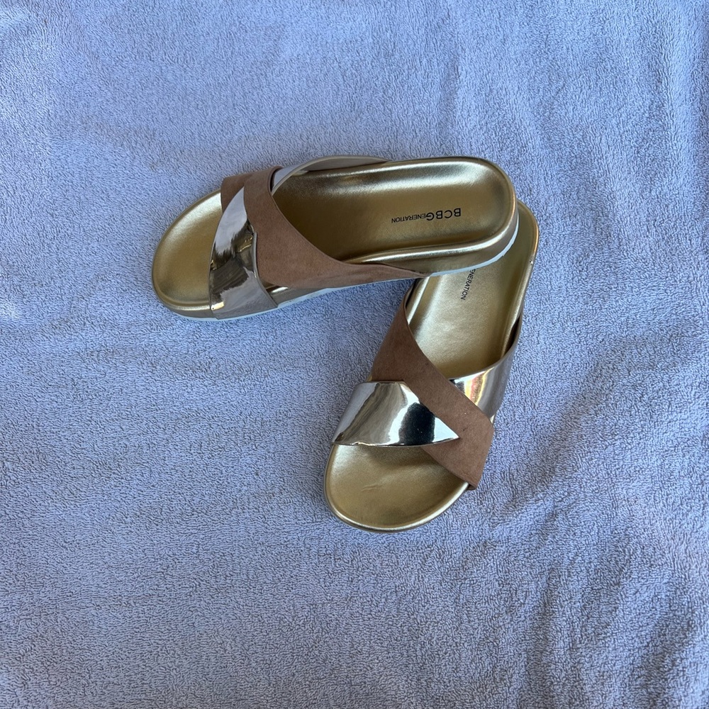 New BCBGENERATION Gold Slide Sandals